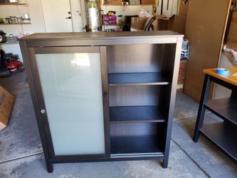 Cabinet with sliding frosted glass doors