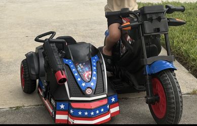 Electric kids motorcycle with sidecar and charger.