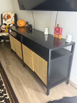 Black TV Stand with Woven Basket Drawers