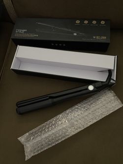 Brand new hair straightener and Curler in one