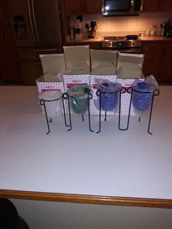 FOUR GLASS FROSTED CANDLE HOLDERS WITH IRON RACKS ALL NEW IN BOXES FROM ENESCO