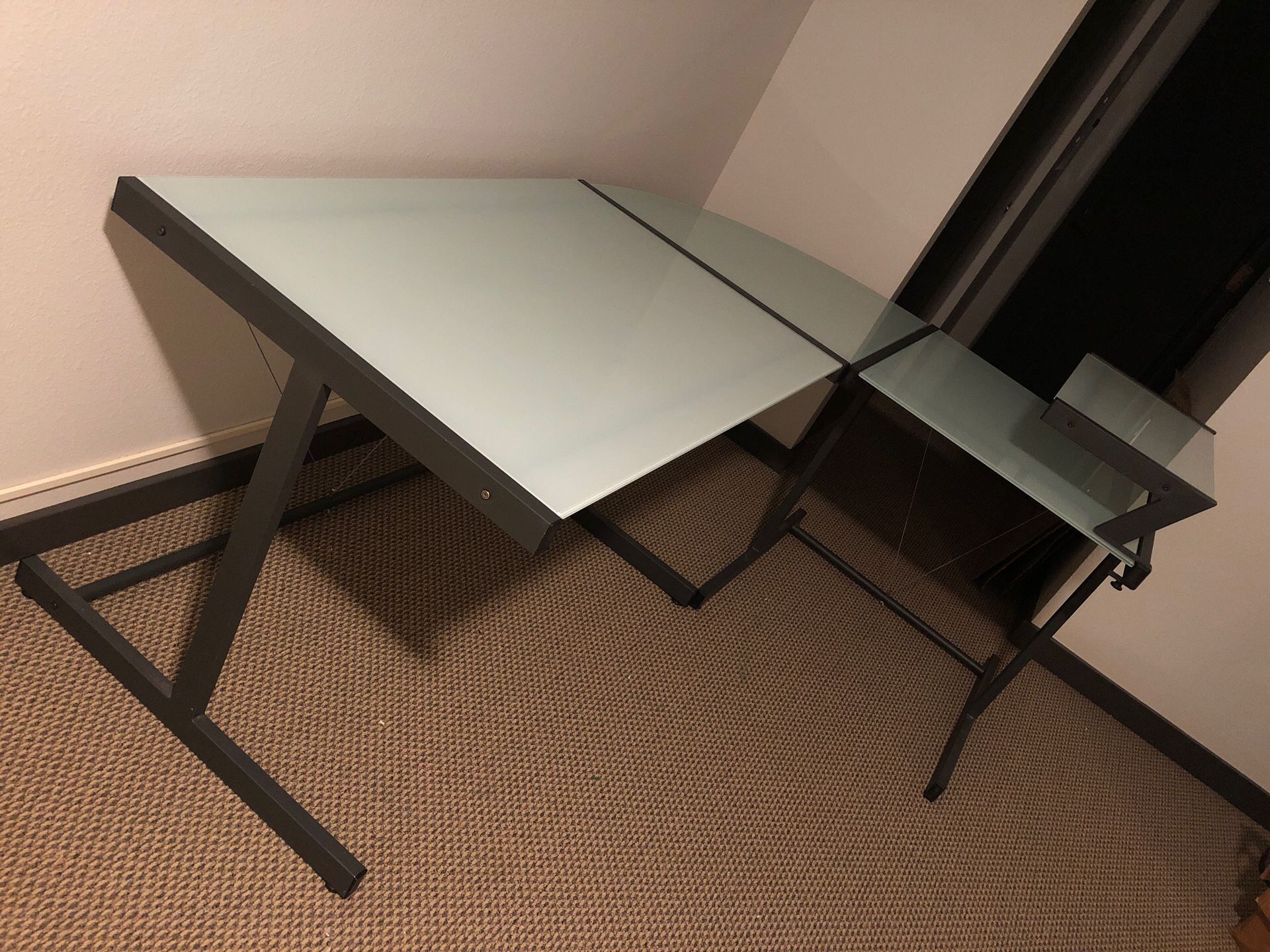 L-shaped glass table with a shelf