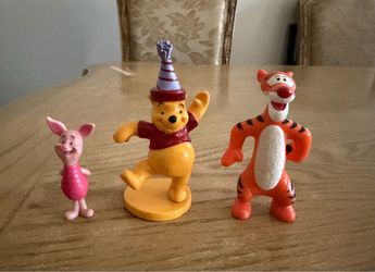 Winnie the Pooh figures or cake toppers