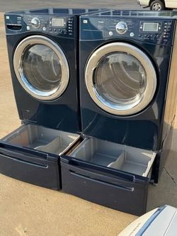Blue color  front load lg steam washer and front load lg steam dryer with pedestals  working perfectly extra for delivery same day de