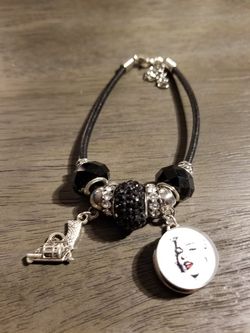 Marilyn Monroe and gun charm bracelet