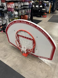 Used Bison 6 in 1 Basketball hoop and height adjusting backboard