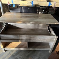 Coffee table with hidden storage