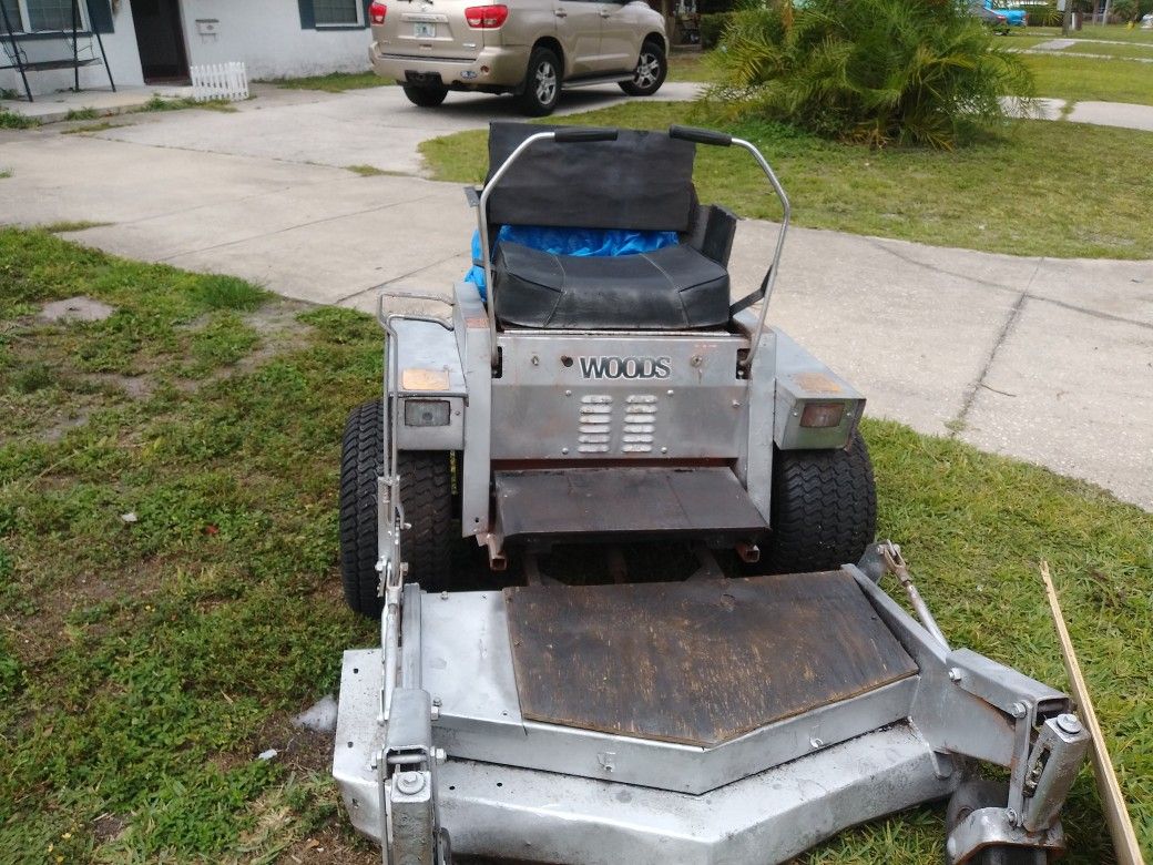 Zero turn riding lawn mower Woods 1850 commercial will trade for golf cart or $600 cash
