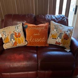 Red Leather Reclindible Sofas