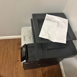 HP LaserJet Pro MFP M521dn monochrome laser multifunction printer. $100