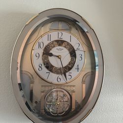 Rhythm Small World Motion and Music Clock