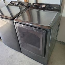 Used Like New Samsung Large Capacity 5.0cu Ft Top Load Washer And Stackable Gas Dryer Set In Black Stainless Steel 
