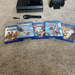 For Sale: PlayStation 4 Bundle – Great Condition! 🎮