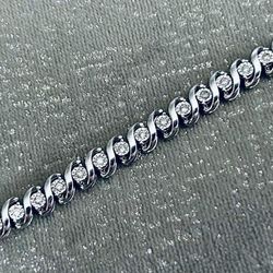 1/2 CT. T.W. Diamond Tennis Bracelet in Sterling Silver