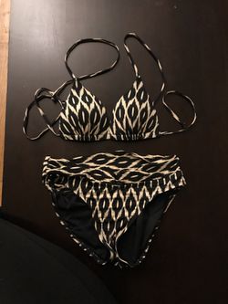 Tan and black bikini