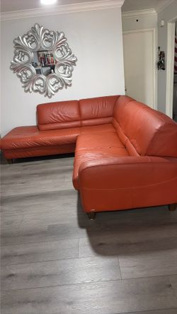 Leather sectional with sofa bed.