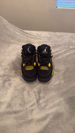 Yellow Thunder Jordan 4s
