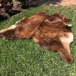 Cowhide Rugs ( Qty 3 ) And Sheepskin Rug 