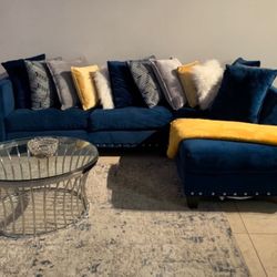 Used Sectional , Area Rug And Glass Table 