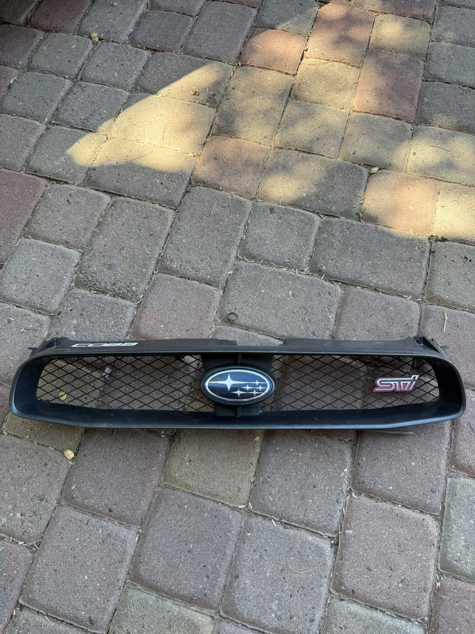 04-05 Subaru WRX STi front grille bumper mesh pink logo