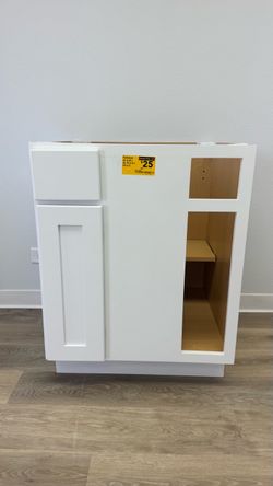 3 white cabinets