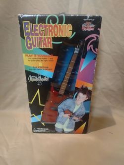 Play Visions electric guitar with box