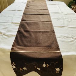 New Table Runner 72” X 14”, Brown With Embroidery And Ribbon Floral Work On Edges.