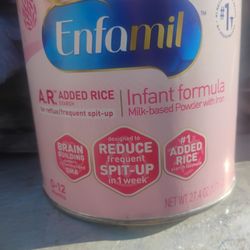 Baby formula  two cans that are 27.4 oz each