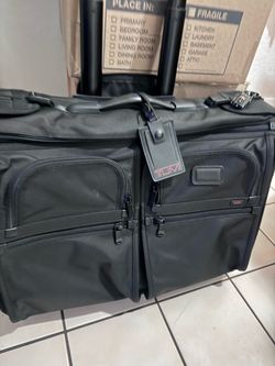 Tumi Black Rolling Carry-On Luggage