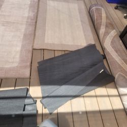 Thin threshold rugs.  (2)
