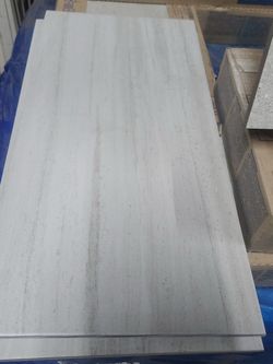 Tile floor 12x24 price $.69 SqFt 17.60sf/box $12.14