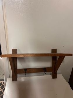 Wooden shelf with 2 metal hooks