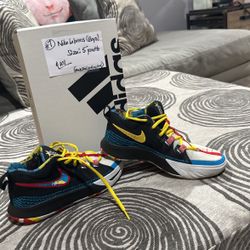 NIKE LEBRON JAMES /Black, teal, yellow, and Red