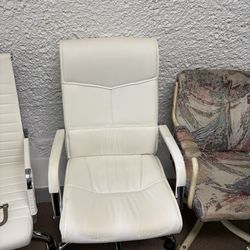 3  white office chairs