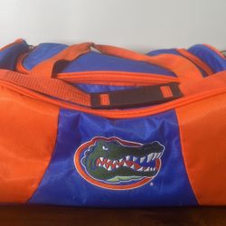 Florida Gators  Nylon Canvas Duffle Travel Bag NCAA Florida Gators Logo Gym Bag. Used in good condition with some cosmetic blemishes. These blemishes 