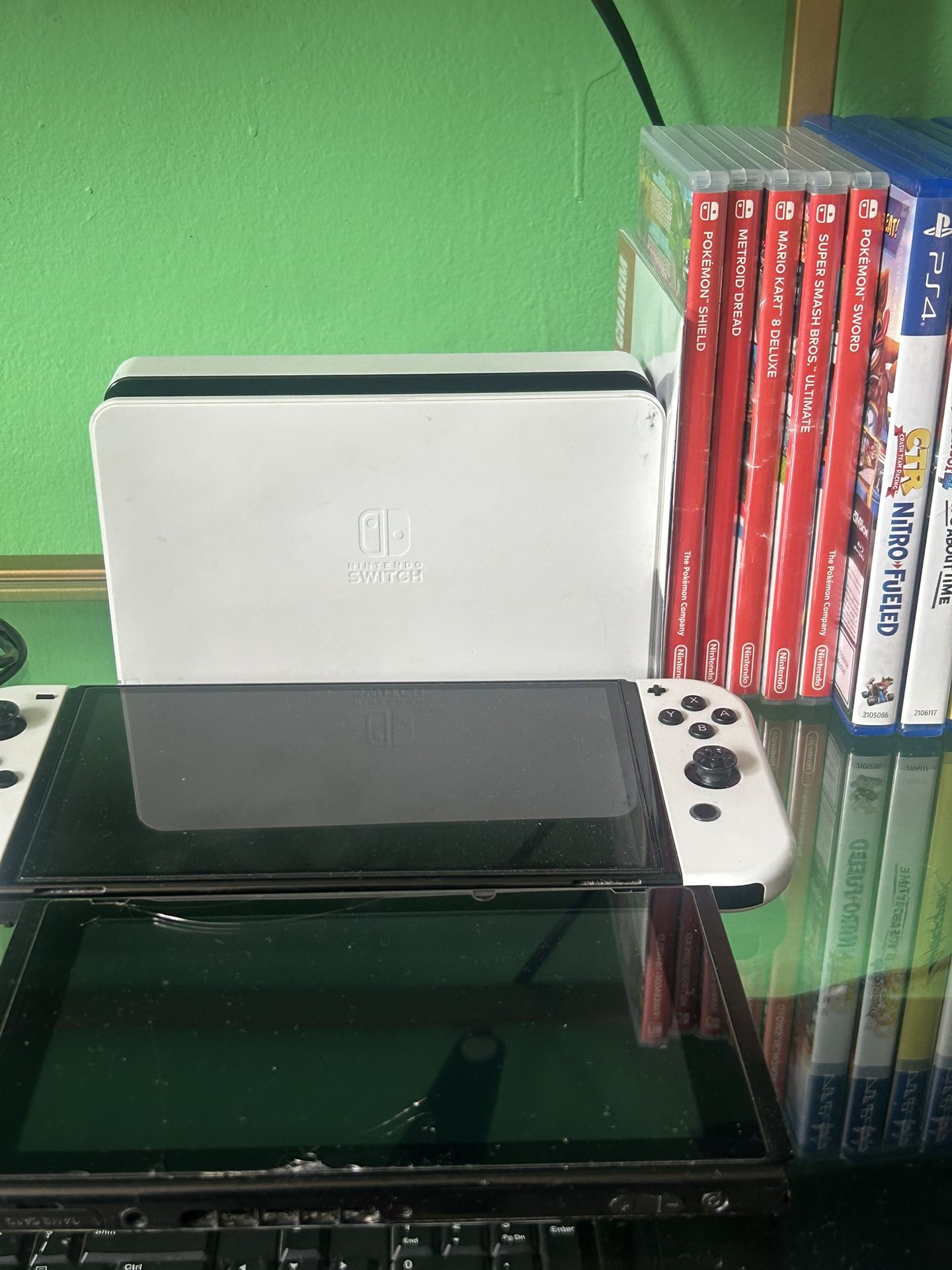 NINTENDO SWITCH OLED AND REGULAR SWITCH CONSOLE