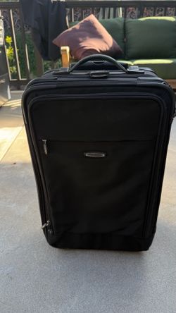 Luggage: Dakota by Tumi 2 Wheel Exoandable Carry On Bag