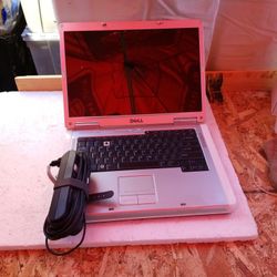 DELL  INSPIRON LAPTOP...WITH  CHARGER INCLUDED  For Parts