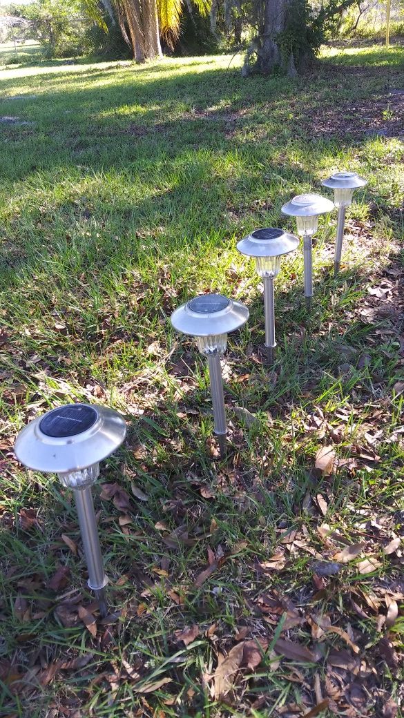 21 Solar Powered Walkway & Yard Lights $35. Cash.