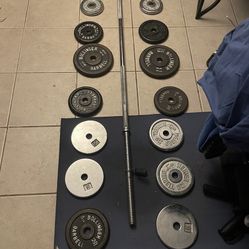 6 Ft Barbell With 82lbs Of Weights 