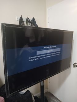 Samsung 40 inch TV with rolling stand