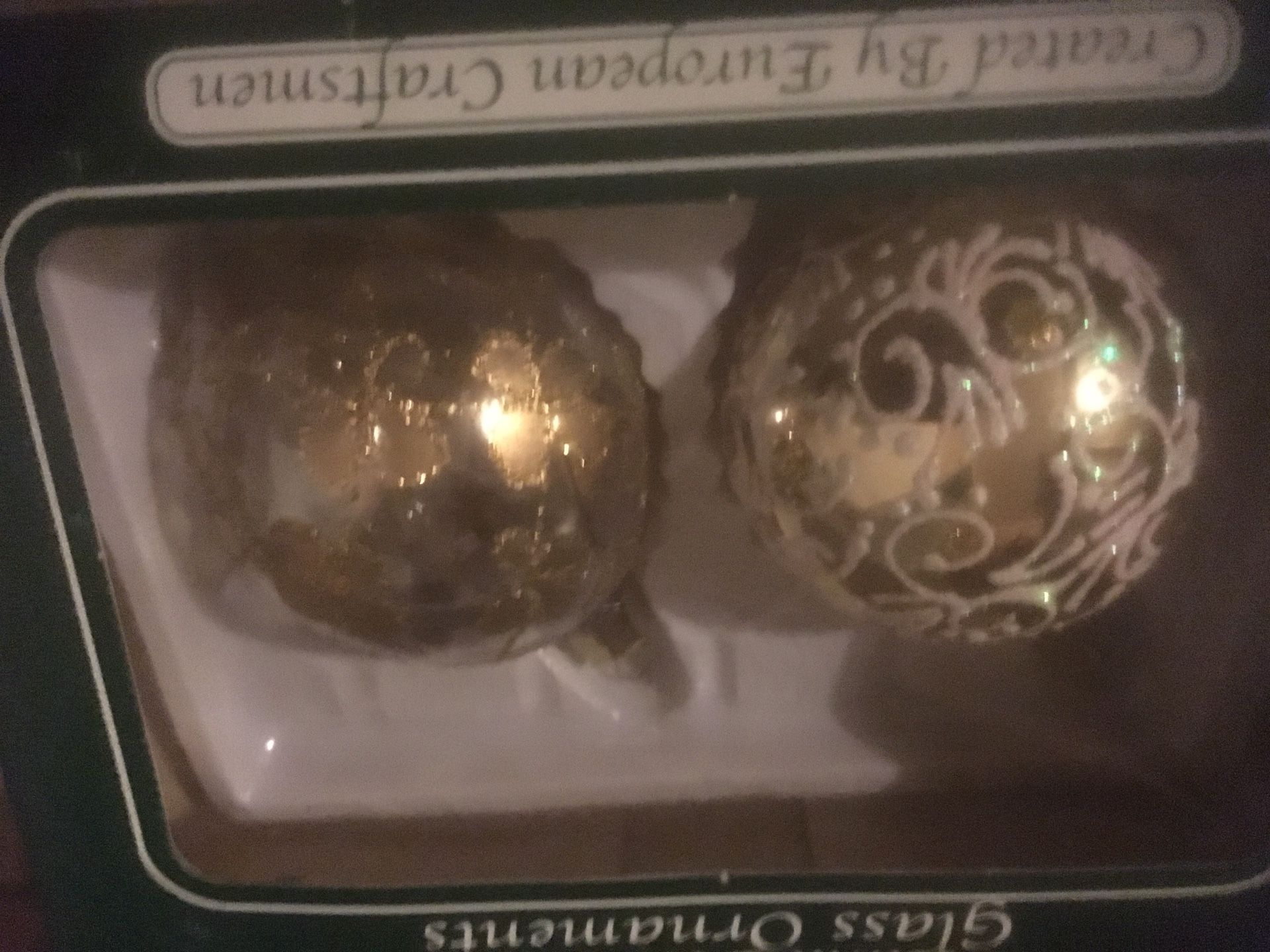 Handcrafted glass Christmas ornaments 4 boxes 2 ornaments in each box. Various colors