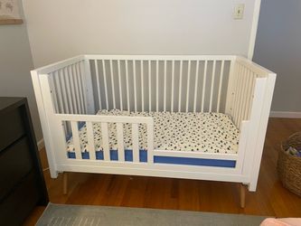 Convertible crib and toddler bed