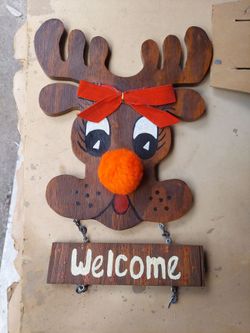 Vintage handmade Christmas reindeer welcome sign