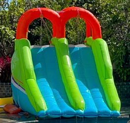 Pool/Water slide by ACTION Air Inflatables