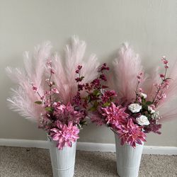 Pink and white silk flowers in vase