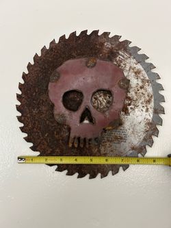 Cool and rare skull on saw blade from NoLa