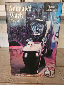 Vintage Halloween Animated Witch
with Skull in Cauldron