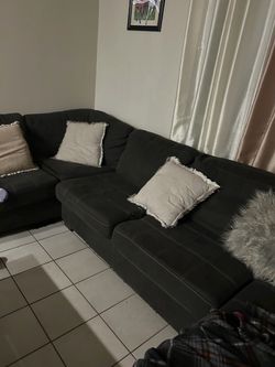 Dark grey L couch