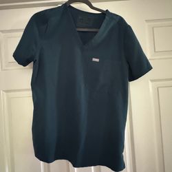 Women’s figs scrubs Caribbean blue size medium top only.